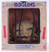 BOGLINS; An original vintage Boglins ' Flup ' action figure. Within the original display 'cage' box.