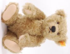 STEIFF; A Steiff mohair teddy bear 000713, with growler. Approx 25cm tall.