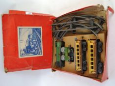 0 GAUGE; An original charming vintage 0 Gauge tinplate trainset.
