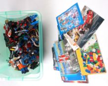 LEGO; A LARGE crate of assorted Lego ' Bionicle ' mostly loose pieces, but some being part built.