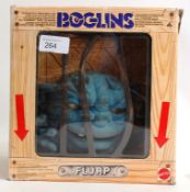 BOGLINS; An original vintage Boglins ' Flup ' action figure. Within the original display 'cage' box.