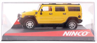 NINCO; Original Ninco 50457 Hummer Yellow Scalextric style slot car, within the original box.