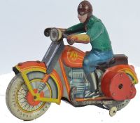 TINPLATE; An original vintage tinplate Russian made clockwork motorcycle and rider.