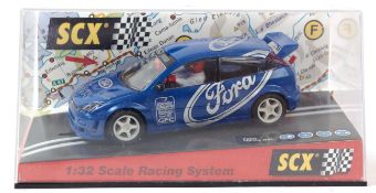 SCX; Original SCX 60270 Ford Focus Scalextric style slot racing car, within the original box.