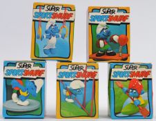 SMURFS; A great collection of 5x vintage original Schleich ' Super Sport Smurf ' figures,