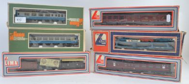 LIMA; A collection of 6x boxed Lima Railways 00 and H0 gauge carriages; 305333W, 305323W, 309053W,