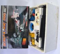 SCALEXTRIC; An original vintage Scalextric 200 electronic racing set, within the original box.