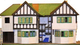 DOLLS HOUSE; A LARGE 20th century mock tudor double gable dolls house.