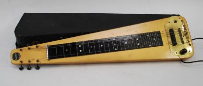 A vintage six string Selmer electric sitar, dials to base complete with the case.