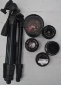 A collection of camera lenses to include Vivitar 1:3.5-5.