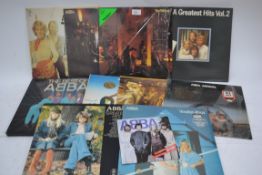 A collection of ABBA records to include The Visitors, Super Trouper, Waterloo, Arrival, Voulez-Vous,