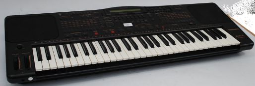 MUSICAL INSTRUMENTS: A Technics KN1000 keyboard piano being complete with stand.