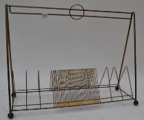 A 20th century vintage record stacking stand of sectional brass construction

UK,