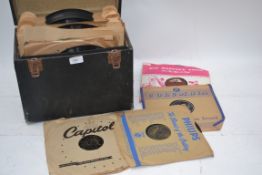 A Vintage record carry case complete with 78 rpm records, dance, big band and other genres

UK,