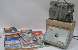 A vintage boxed Zeiss Ikon Movilux 8B cine projector along with a collection of Amateur Cine World