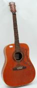 A vintage 20th century Spanish acoustic guitar.