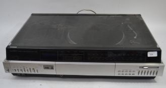 A retro 1970's Sony Stereo Music System Model No HMK-7000 having silvered body with smoked acryllic