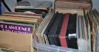 A large collection of vinyl records to include classical and big band many different artists.