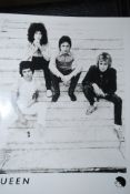 A vintage press photograph of Queen,