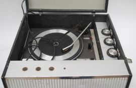 A vintage Bush portable record player together with a vintage Hacker Hunter portable radio and a