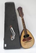 An early 20th century pear shaped bowl back mandolin ( Musical Instrument )  impressed mark