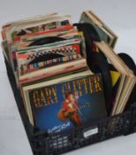Collection of 45 rpm vinyl singles dating from the 1960's to include Gary Glitter and other