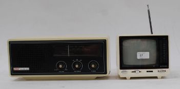 A vintage Surefinder radio alarm clock along with a vintage portable radio.