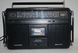 A retro Grundig portable radio cassette player ' Ghetto Blaster '
UK,