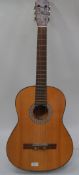 A vintage six string acoustic Spanish guitar by El Primo

UK,