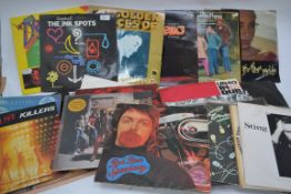 A collection of vinyl Long Play records to include UB 40, Sade, Queen, Wings, Sad Cafe etc

UK,
