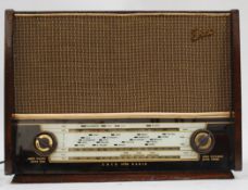 A vintage wooden cased Ecko A320 valve radio, in working order recently serviced and PAT tested.