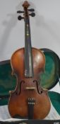 A students violin and bow complete with the original case of Chinese origin

UK,