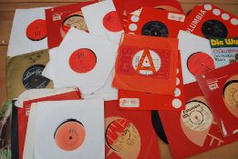 A collection of several 45 rpm 7