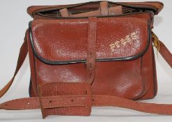 A Soviet Jupiter camera lens4/135mm.No 6327567 complete in leather case.