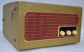 A Feranti vintage 1950's cased record player having two tone case in cream and white ( see