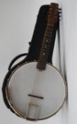 A 1920's Hawkes & Son open back banjolin - banjo mandalin musical instrument complete with the case.