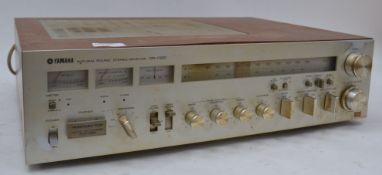 A retro 1970's Yamaha CR1020 AM/FM receiver radio deck having the original teak wood surround