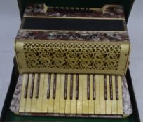 MUSICAL INSTRUMENT A wonderful vintage 20th century cased Francesco Modello Accordion having