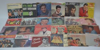A large collection of 45rpm EP vinyl records to include The Beach Boys, Helen Sharpiro,