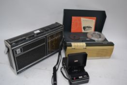 A vintage Grundig radio along with a vintage tape recorder by Stellaphone with microphone also with