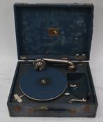 A HMV vintage 20th century table top gramaphone set within a blue case having hinged top ( see
