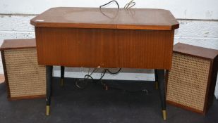 A vintage 1950's Garrard R121 record player in teak cabinet with hinged top together with the