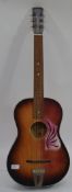 A vintage Egmond steel stringed acoustic guitar. Rarer version with the adjustable neck.