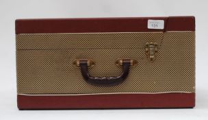 A cased 1950's / 1960's Pilot Encore portable record player  having a  Collard deck with hindged