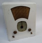 A large 1940's Defiant valve radio having later painted finish but with fabulous facia and original