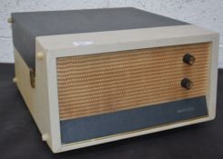 A vintage wooden cased Murphy valve radio A426C in working order being recently serviced and PAT