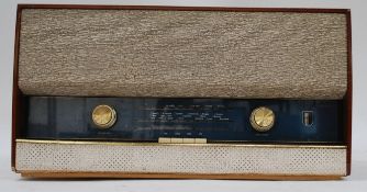 A vintage wooden cased Bush VHF91 valve radio,