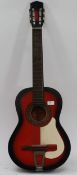 A 20th century Spanish Acoustic two tone guitar bearing label to interior

UK,