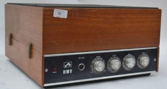 A vintage / retro HMV portable record player, having a BSR record deck,