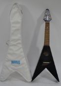 MUSICAL INSTRUMENTS: An 'as new' Mahalo ' Flying V ' shaped ukulele,